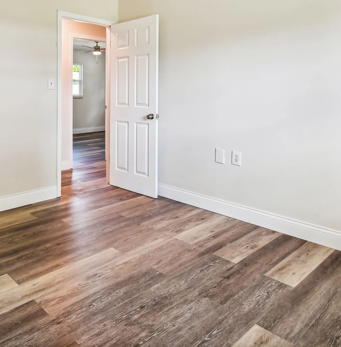Finished tile floor sitting flat and level in a Central Florida home by Guy A Remodeling