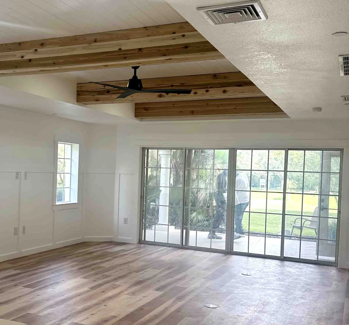New door frame set plumb in a prepared opening during installation by Guy A Remodeling