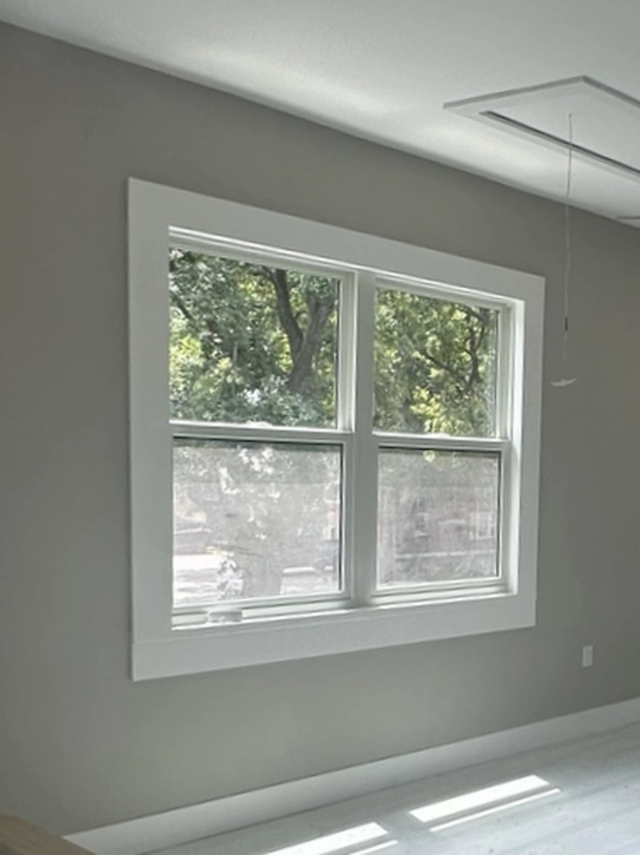 Bright room with a new sealed window pulling in daylight by Guy A Remodeling