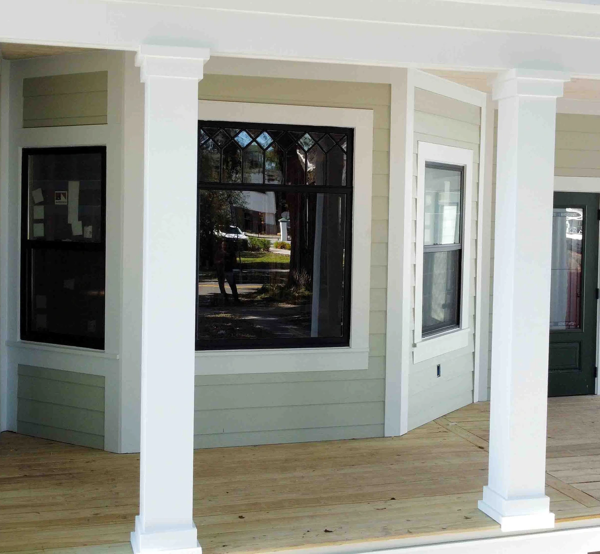 Single hung and slider window styles in different frame colors by Guy A Remodeling