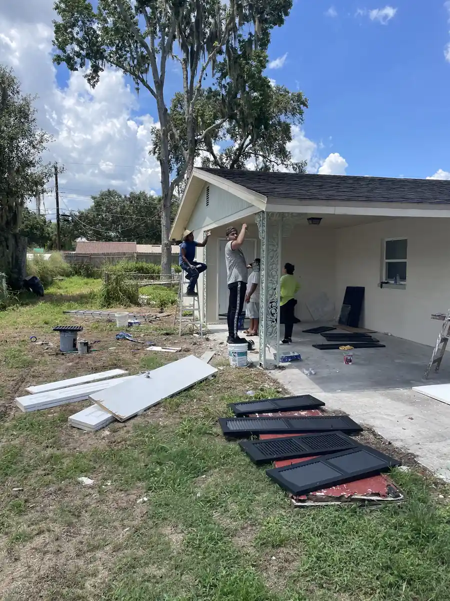 Crew installing new roofing during the Lakeland ranch remodel