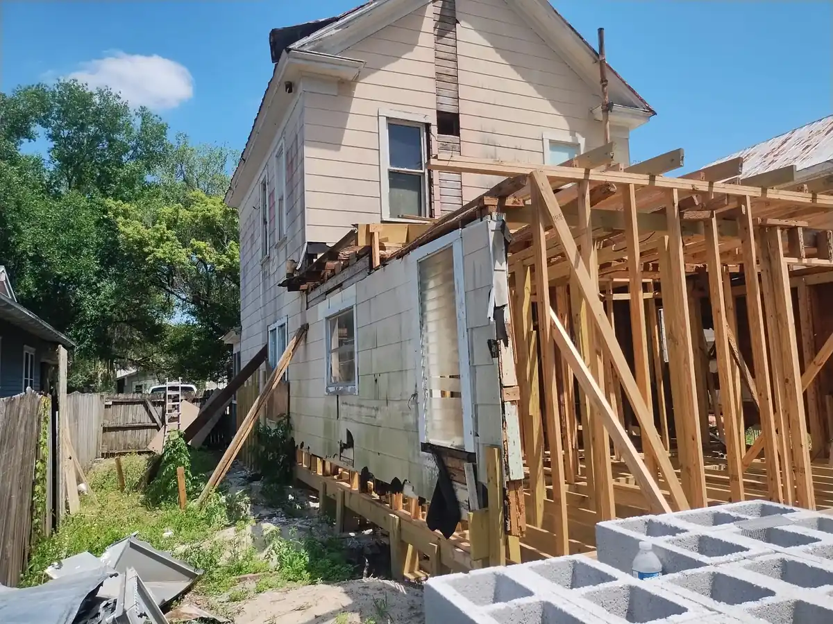 Original Lakeland home exterior before the full remodel and addition