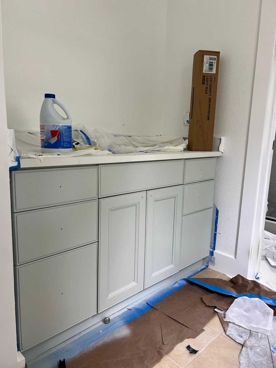 Gutted kitchen with framing and taped walls during the Kissimmee remodel