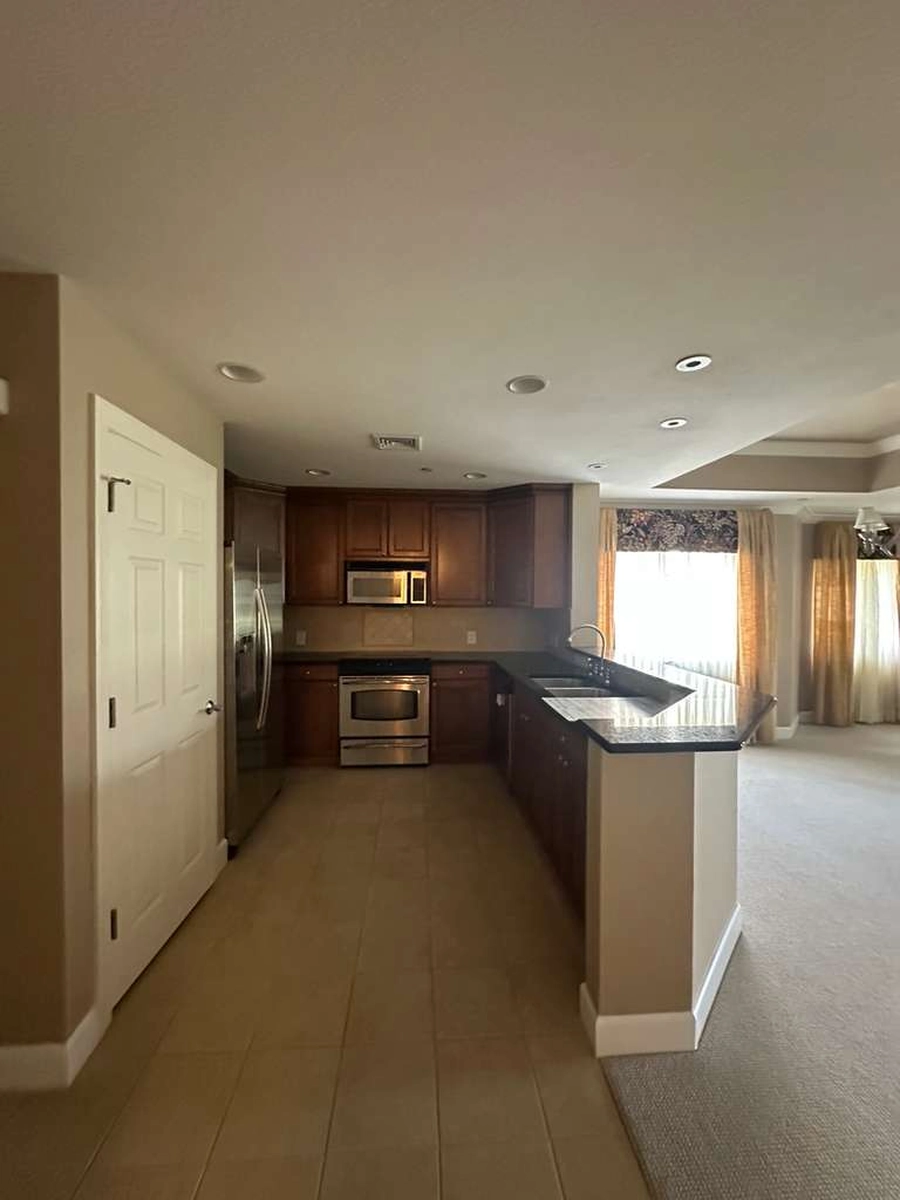 Two kitchens in Kissimmee before remodeling